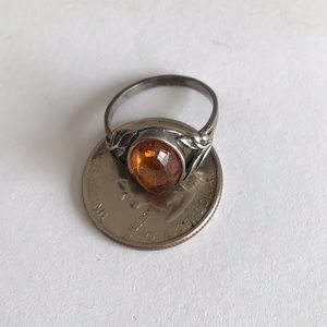 .925 sterling silver ring with amber stone